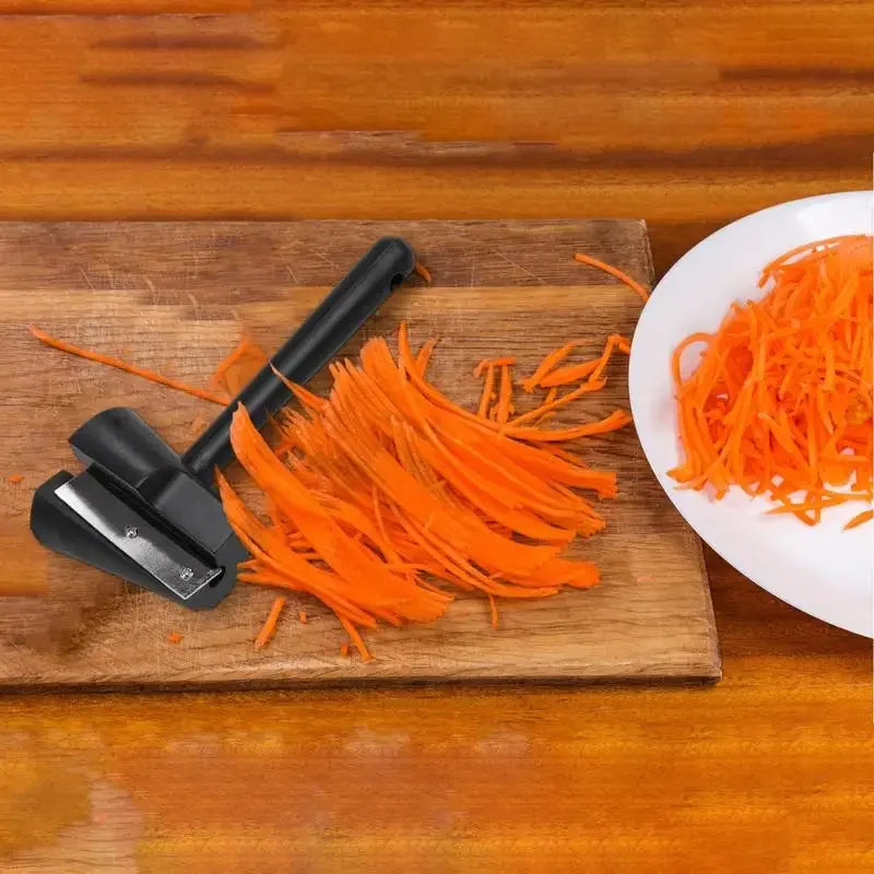 Spiral fruit peeler