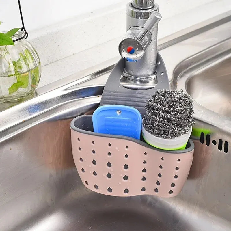 Hanging drain basket and adjustable soap and sponge holder