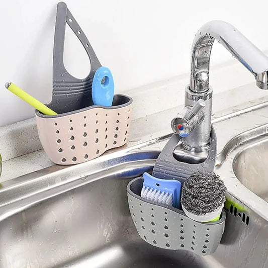 Hanging drain basket and adjustable soap and sponge holder